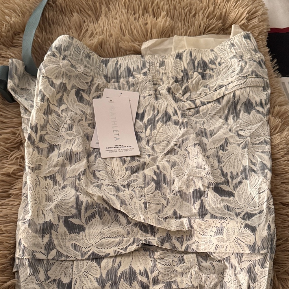 Athleta White and Gray Floral pants. Zippers on different levels